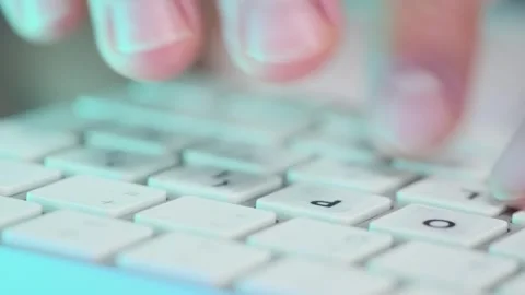 Programmer hands typing on a white keyboard, coding and searching online. Stock Footage 294162885