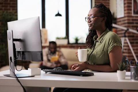 Programmer at home relaxing using computer for streaming online series while 스톡 사진