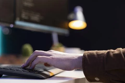 Programmer implementing and maintaining IT security measures Stock Photos