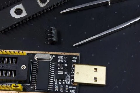 Programmer with inserted microchip memory. electronics repair Stock Photos