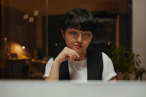 Programmer Looking at Code on Screen Stock Photos