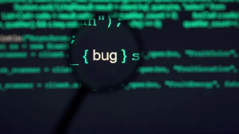 The programmer is looking for a flaw in the program code. Stock Footage 146045172