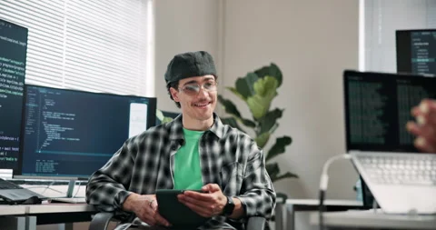 Programmer, man and tablet in office for advice, technical guidance and feedback Stock Footage 346762014