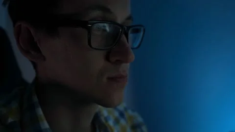 Programmer man looks through program on computer display Stock Footage 164020870