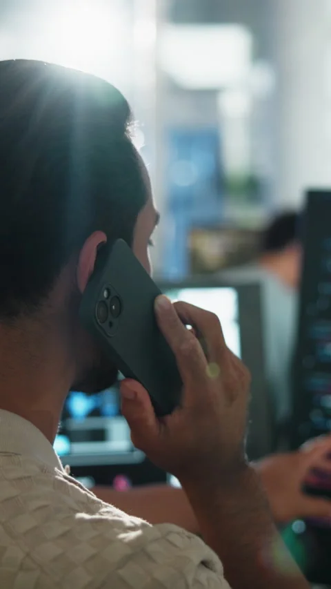 Programmer, man or computer with phone call in office for code review, system 스톡 동영상 333235718