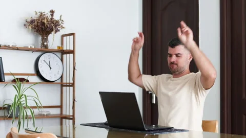 Programmer man successfully solved assigned task. Stock Footage 314006723