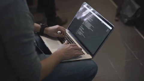 Programmer occupation - writing programming code on laptop Stock Footage 69753595
