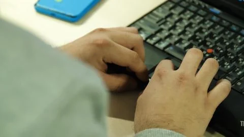 Programmer occupation - writing programming code on laptop. Coding code program Foto stock