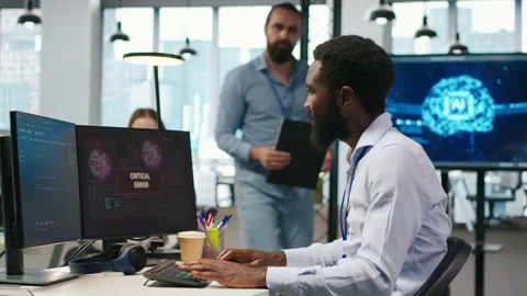 Programmer in office requesting help from coworkers to fix critical error Video stock 313168467