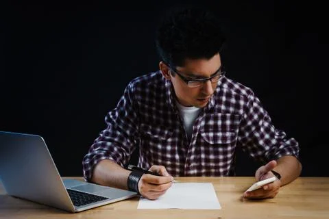 Programmer in the office working on the computer Stock Photos