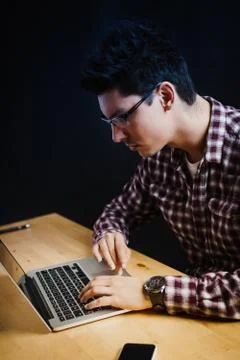 Programmer in the office working on the computer Stock Photos