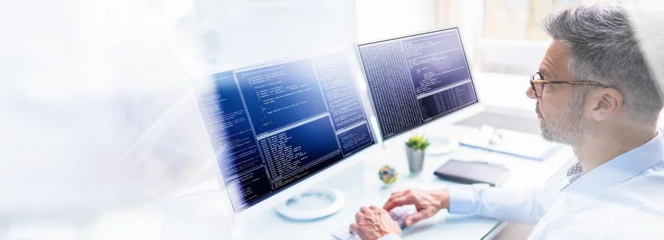 Programmer In Office Working Stock Photos