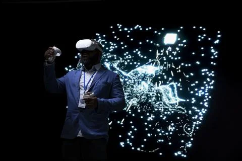 Programmer optimizing AI agent using virtual reality simulation Stock-Fotos