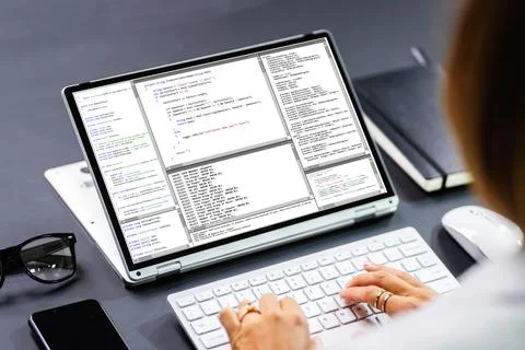 Programmer Or Coder At Office Desk Stock Photos