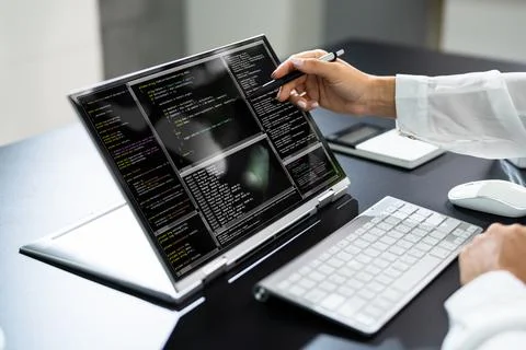 Programmer Or Coder At Office Desk Stock Photos