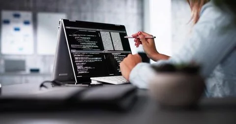 Programmer Or Coder At Office Desk 스톡 사진