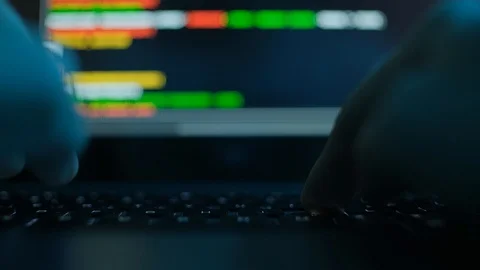 Programmer or computer hacker typing code on laptop keyboard. Closeup Stock Footage 117628042