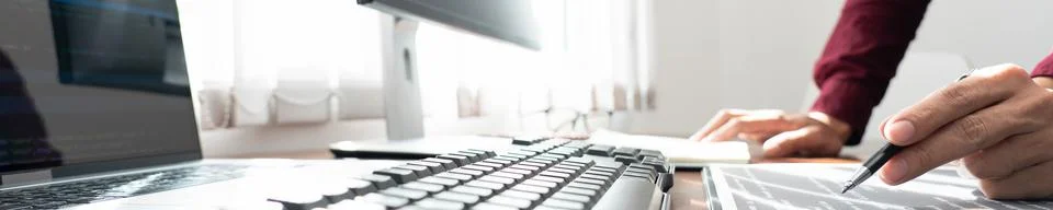 Programmer or software developer Typing New Lines of Code, coding technologie Stock Photos