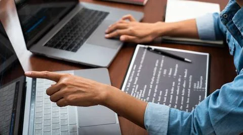 Programmer or software developer Typing New Lines of Code, coding technolo... Stockfoto's