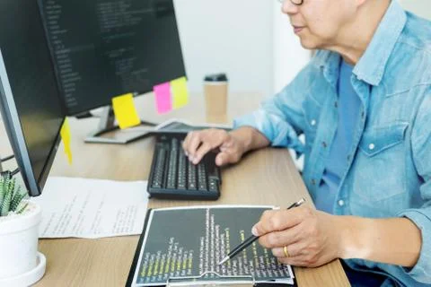 Programmer Outsource Developer coding technologies Website design. Mobile App Stock Photos