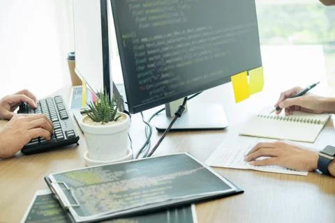 Programmer Outsource Developer coding technologies Website design. Mobile App Stock Photos