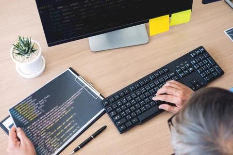 Programmer Outsource Developer coding technologies Website design. Mobile App Stock Photos