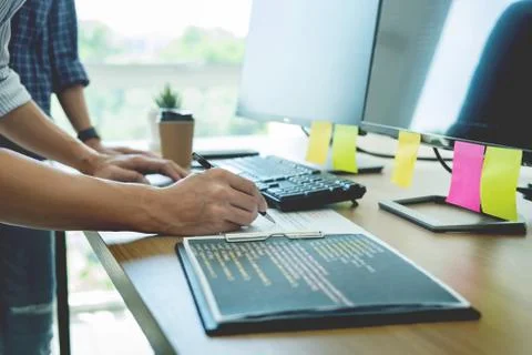 Programmer Outsource Developer Team coding technologies Website design. Mobil Stockfoto's