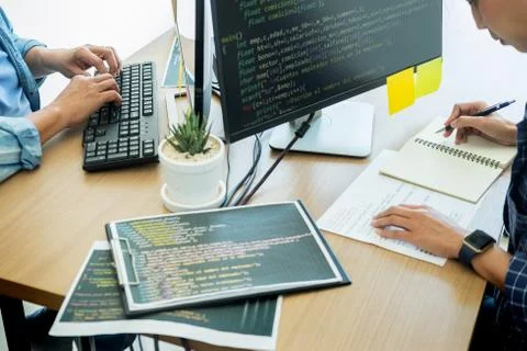 Programmer Outsource Developer Team coding technologies Website design. Mobil Stock Photos