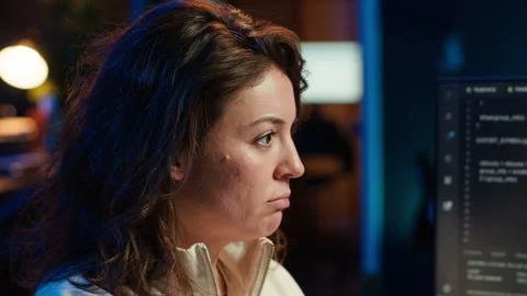 Programmer paying attention to PC screen, installing code, close up Video stock 283692589