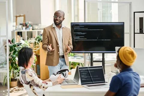 Programmer presenting new software for VR glasses Stock Photos