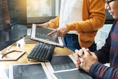 Programmer programming and coding  software designer working on project in IT Stock-Fotos