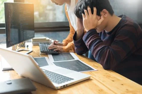 Programmer programming and coding  software designer working on project in IT Stock-Fotos