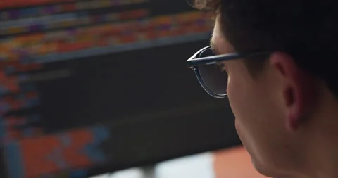 Programmer, reading and code with HTML on computer screen for software Stock-Footage 318773748
