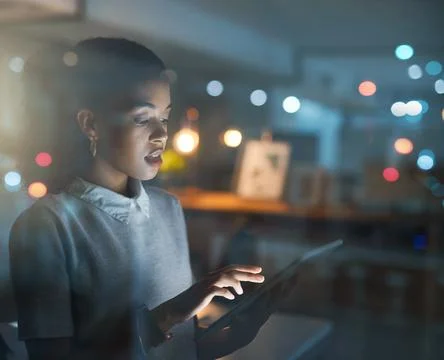 Programmer, reading and night in office with tablet, research and coding up.. Stock Photos