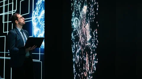 Programmer reconfiguring AI node connections using augmented reality Stock-Fotos
