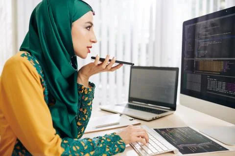 Programmer recording voice message Stock Photos
