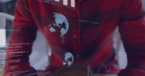 Programmer in red plaid shirt analyzing holographic overlays in office, with Foto stock