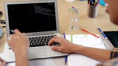 Programmer responding to coworker hand reaching, tapping keyboard with pen and Stock-Footage 334465931