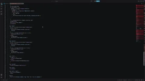 Programmer reviewing lines of source code inside dark software development .. Stock Footage 342541028