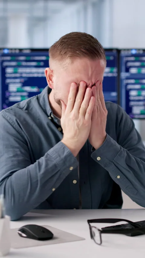 Programmer Rubs Itchy Eye While Working Long Hours Stock Footage 332496432