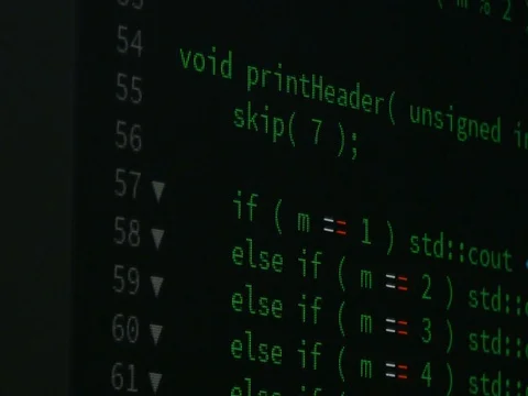 Programmer scrolling up and down and checking code for editing futuristic tec Stock Footage 81081175