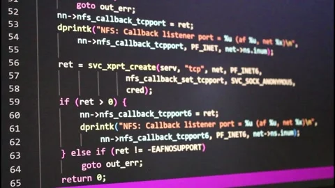 Programmer scrolling through colorful software code on a dark background Stock Footage 201335122