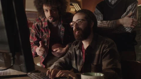 Programmer Showing New Computer Software to Colleagues Stock Footage 263300094