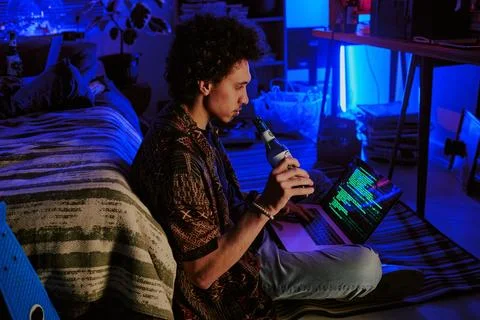Programmer Sipping Slowly Beer 写真素材