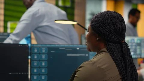 Programmer solving tasks with AI LLM chatbot answering prompts Stock Photos