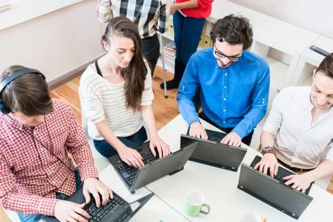 Programmer in startup business working on computer Foto stock