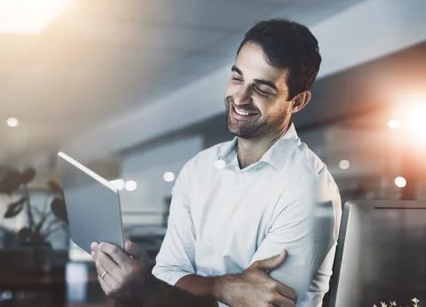 Programmer, tablet and night with office, research and overtime work and data Stock Photos