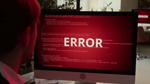 Programmer Taking off Glasses and Looking at Computer Monitor Displaying Error Video stock 331532878
