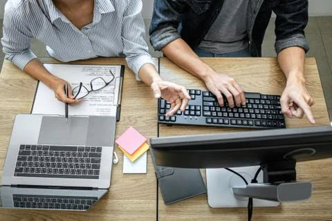 Programmer Team of  Developing programming and website working in a software Stock-Fotos