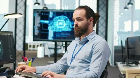 Programmer testing generative AI machine learning algorithms and listening music Stock-Footage 313016625